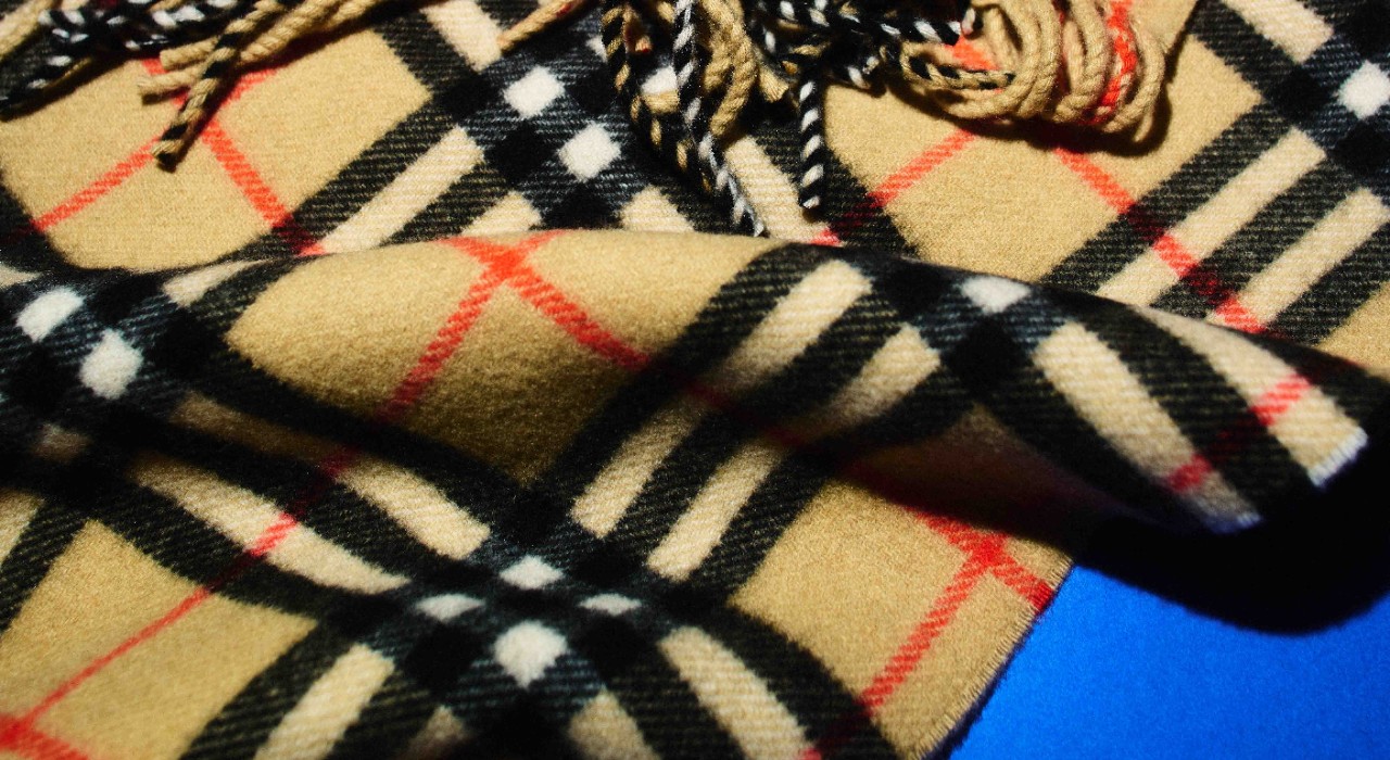 A close-up of a Burberry check cashmere scarf.