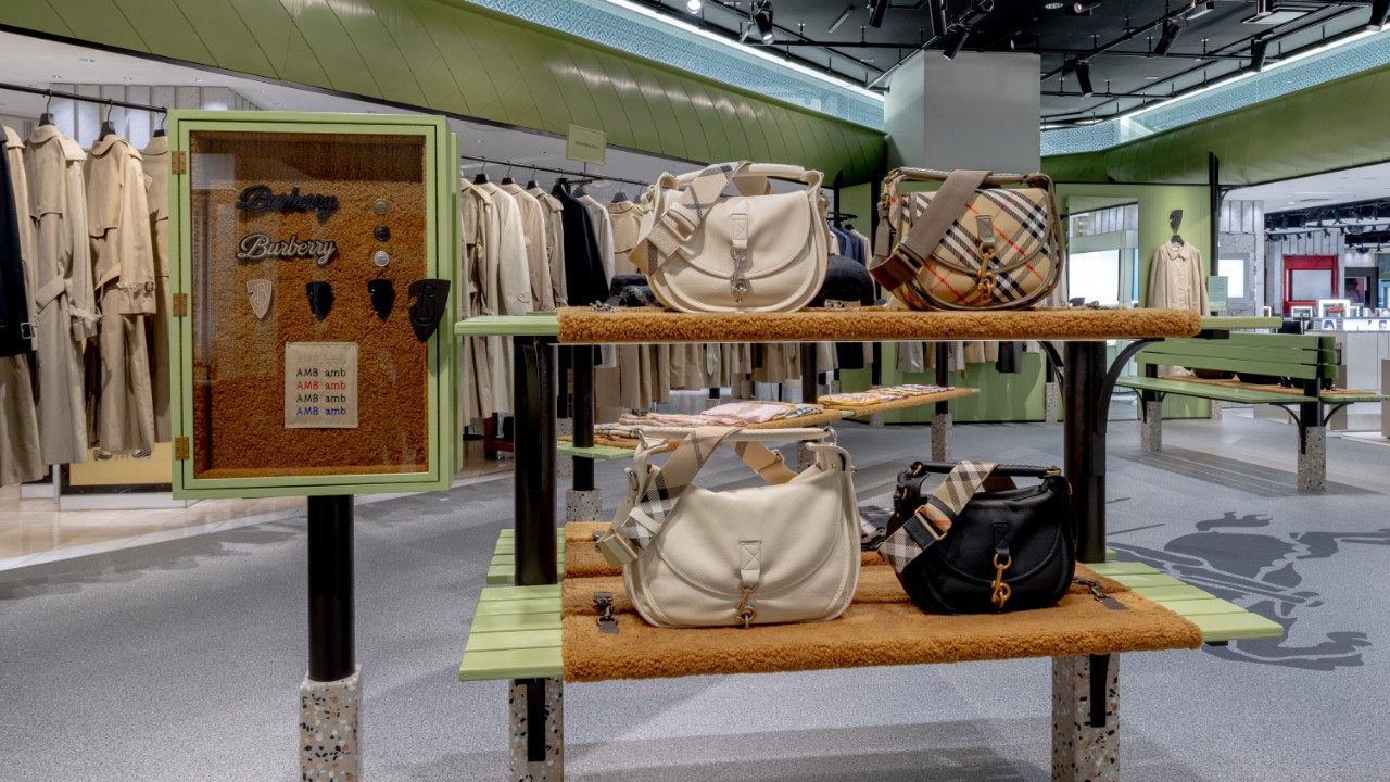 A close-up of Burberry’s iconic beige, black, and red check pattern, symbolising the brand’s timeless British heritage and craftsmanship.