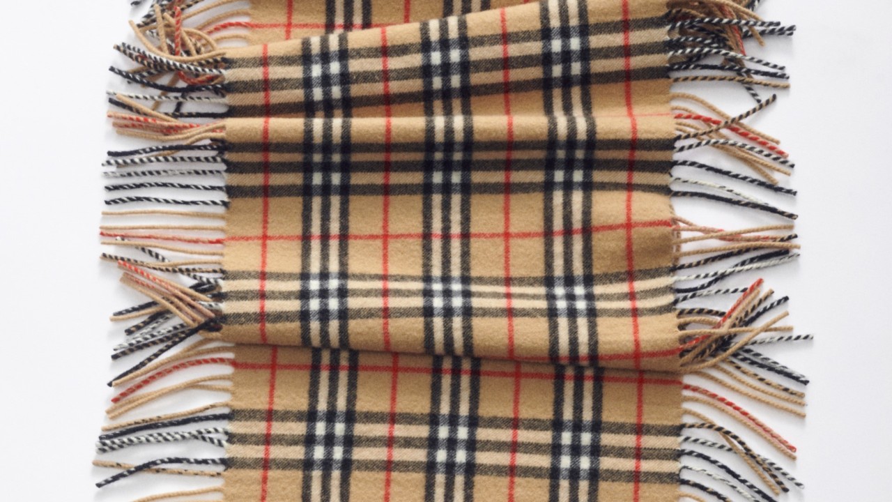 A close-up image of a Burberry checked scarf with fringed edges. Access information about shareholder registrars and how to manage share-related enquiries.